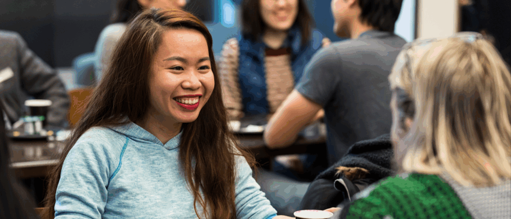 Two Algonquin College students share a meal on campus. 