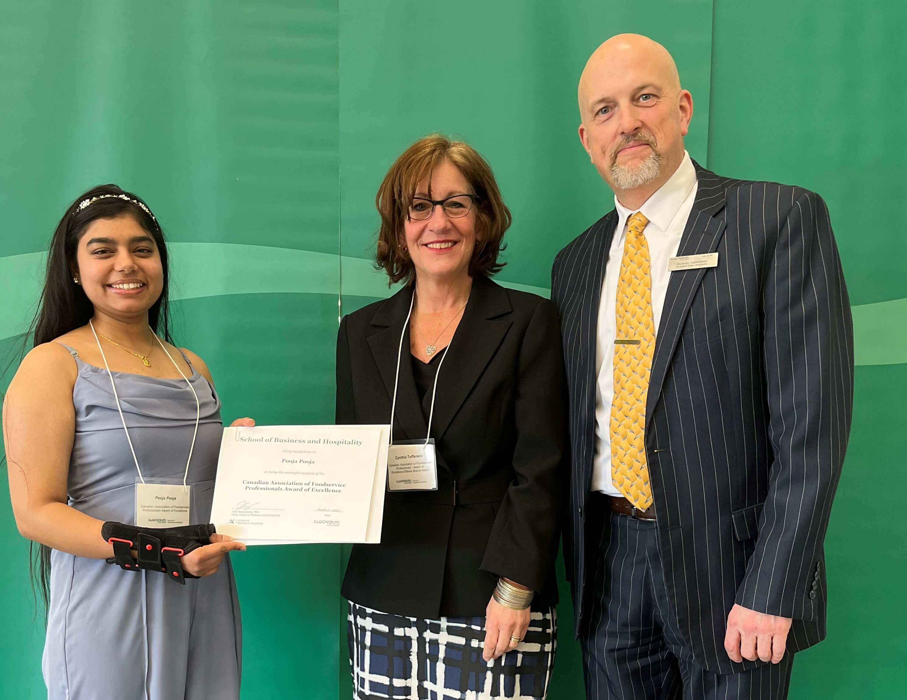 Student Pooja Pooja, Recipient of the CAFP Award of Excellence, with professors