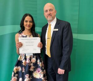Janhavi Nitin Alaknure posing with their award