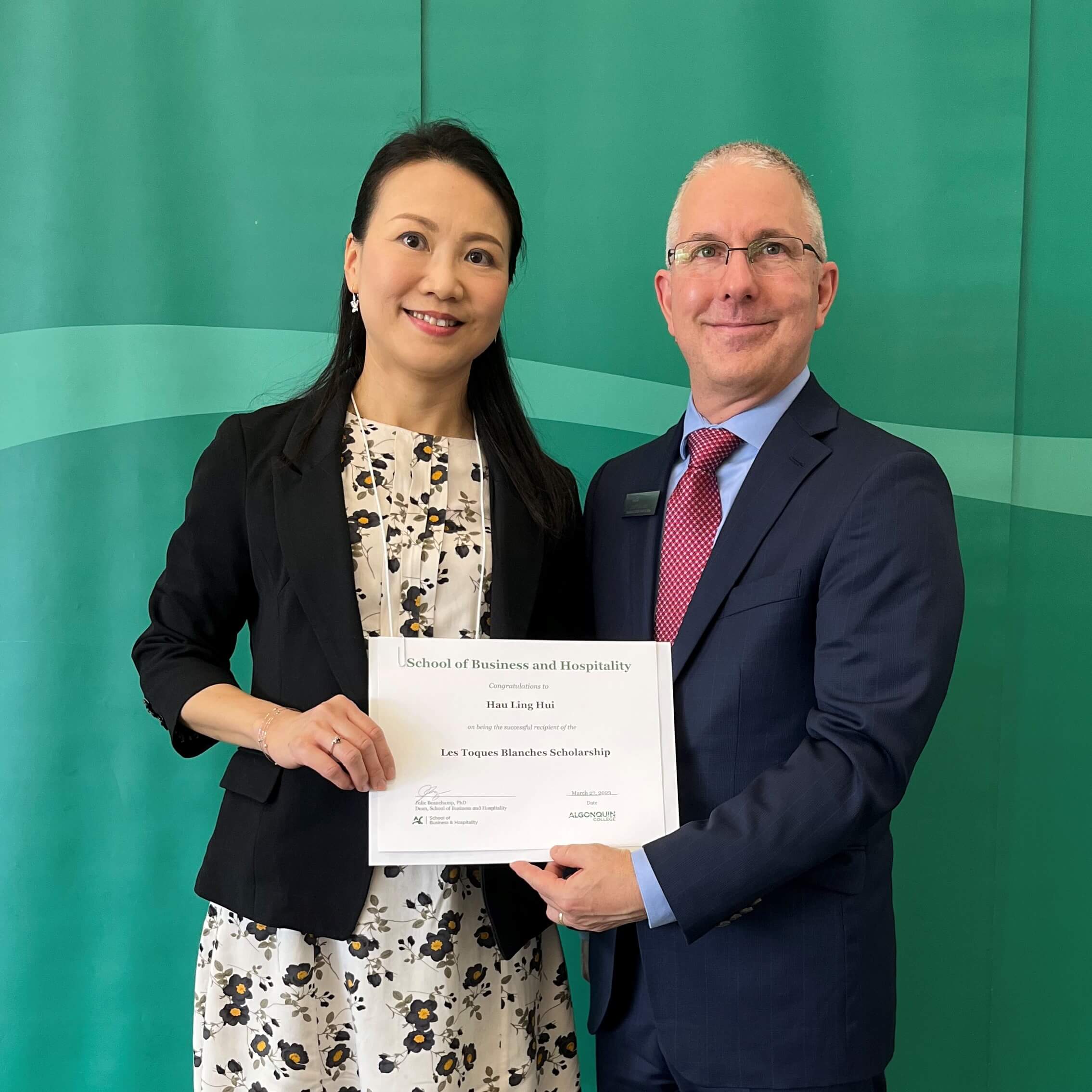 Student Hau Ling Hui, Recipient of Les Toques Blanches Scholarship, with professor