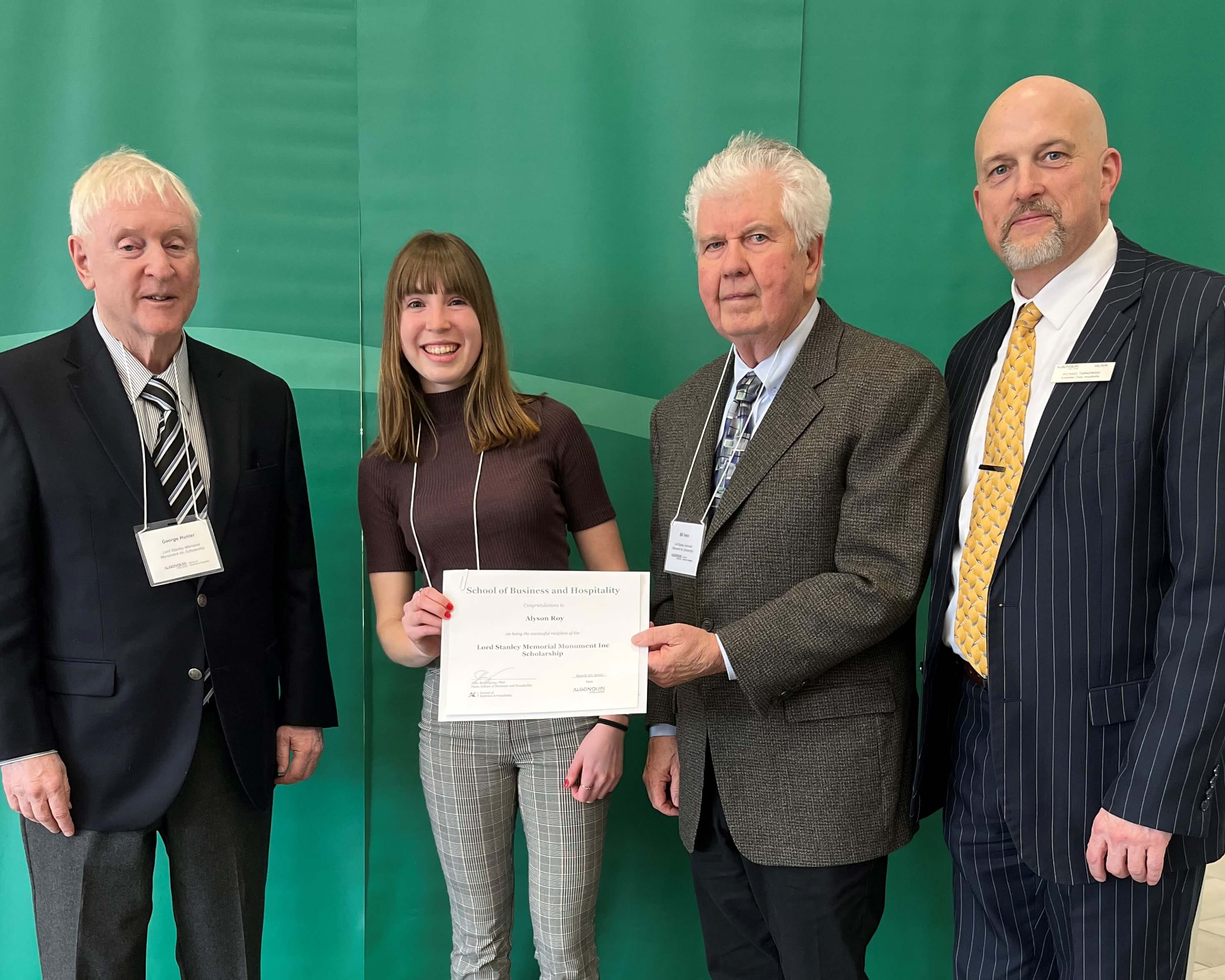 Student Alyson Roy, Recipient of the Lord Stanley Memorial Monument Inc. Scholarship, with professor