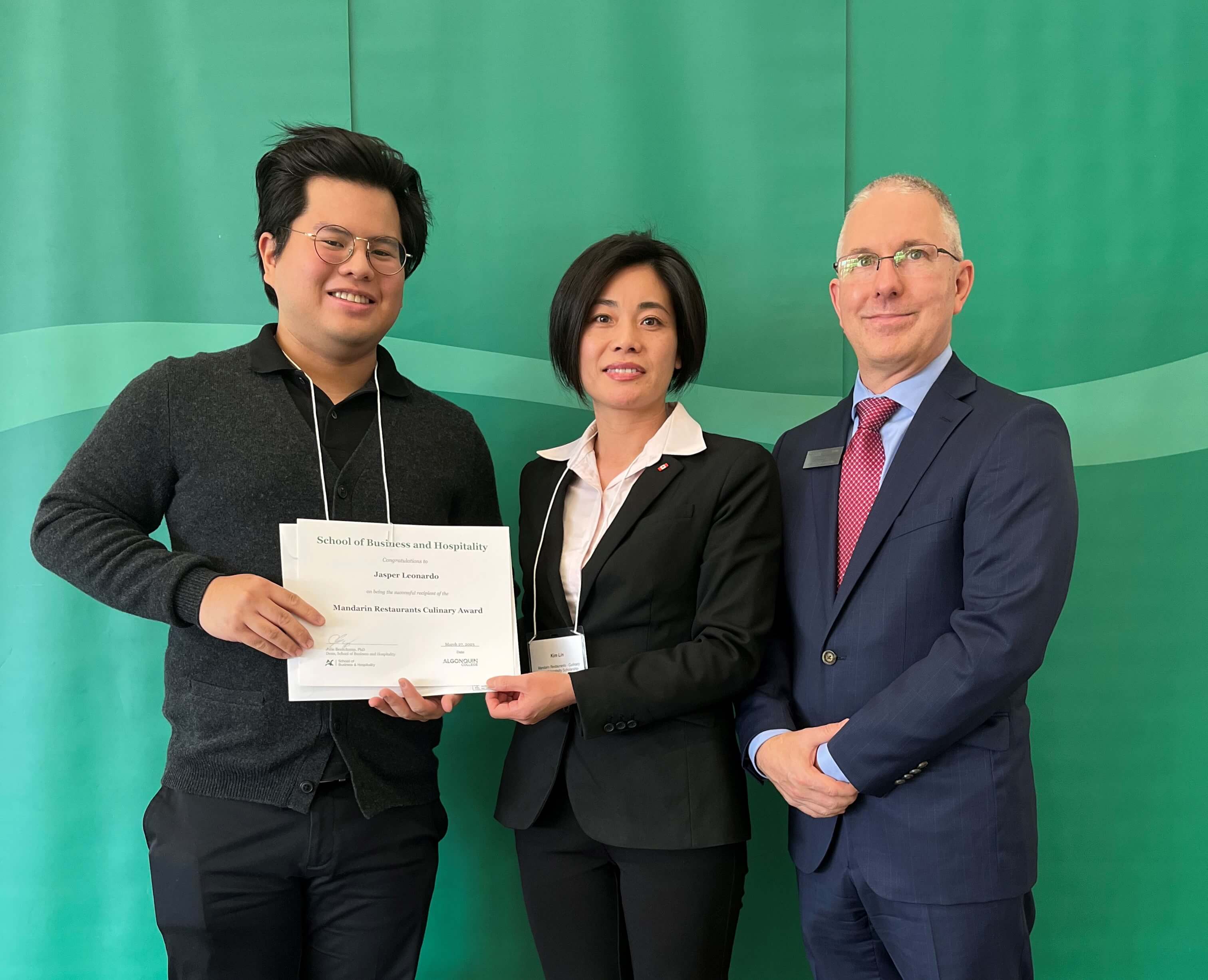 Student Jasper Leonardo, Recipient of the Mandarin Restaurants Culinary Award, with professors