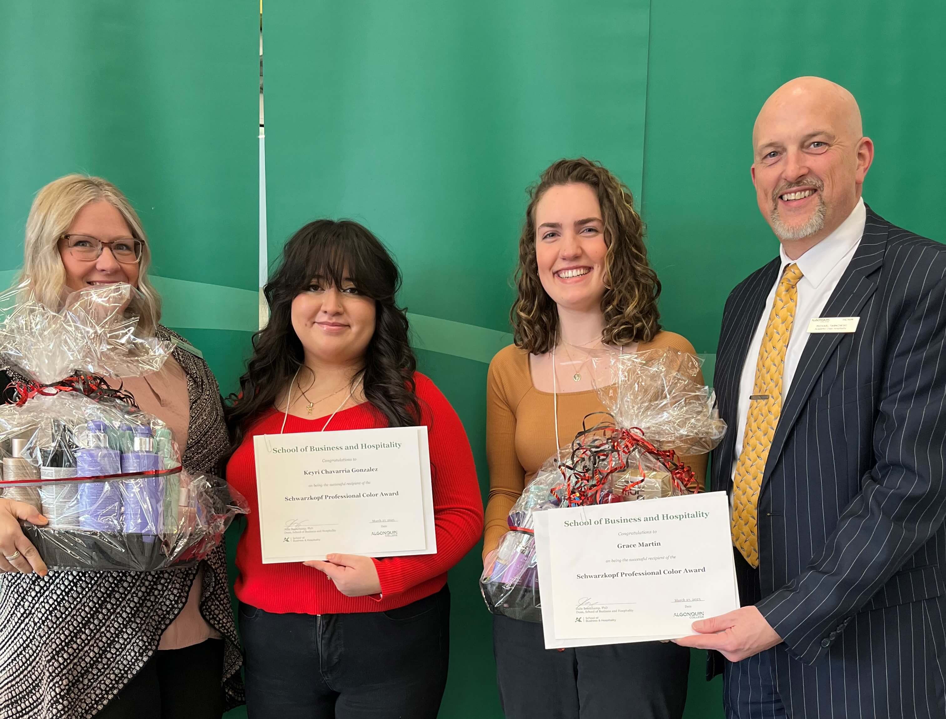 Students Grace Martin and Keyri Chavarria Gonzalez, Recipients of the Schwarzkopf Professional Award, with professors