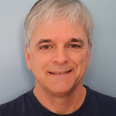 Smiling Business Administration professor James Halls