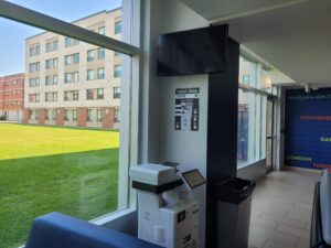 An image of a Ricoh multi function printer located on the second floor of Residence in the main lobby.
