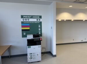 An image of a Ricoh multi function printer located on the second floor of P building in the study lounge