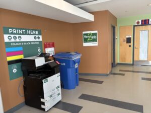 An image of a Ricoh multi function printer located on the third floor of T building near room T301