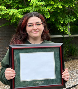 Photo of Elizabeth with prize.