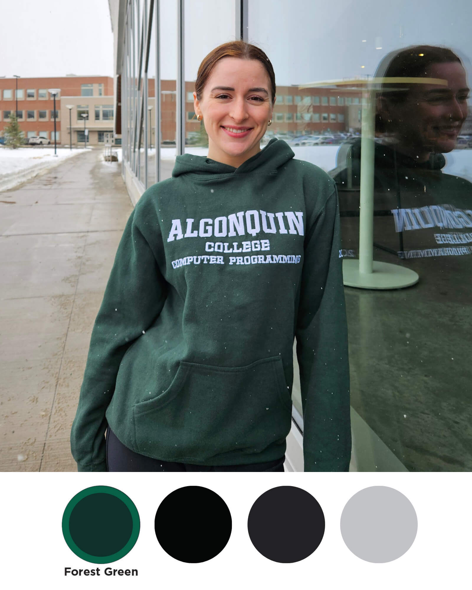 Custom Hoodie Week - Forest Green College student wearing an Algonquin College Hoodie in the forest green pullover style
