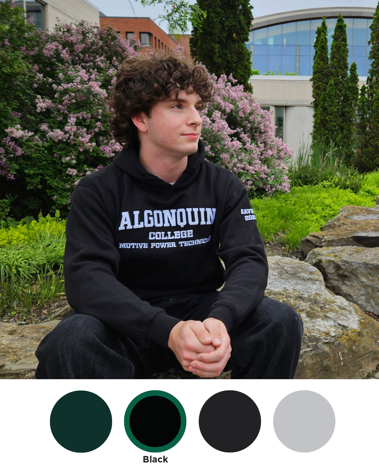 Custom Hoodie Week - Black Pullover College student wearing an Algonquin College Hoodie in the black pullover style