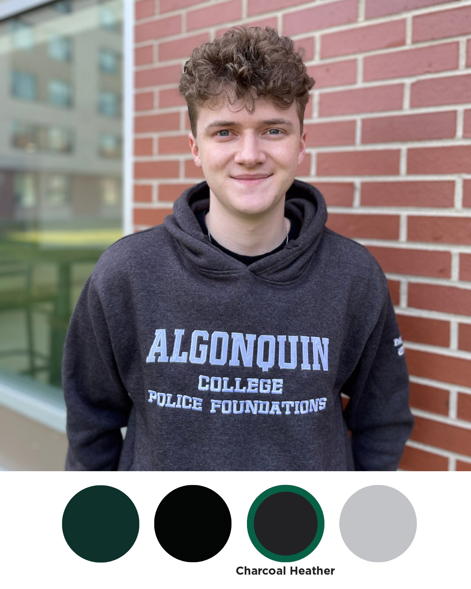 Custom Hoodie Week - Charcoal Heather College student wearing an Algonquin College Hoodie in the charcoal heather pullover style