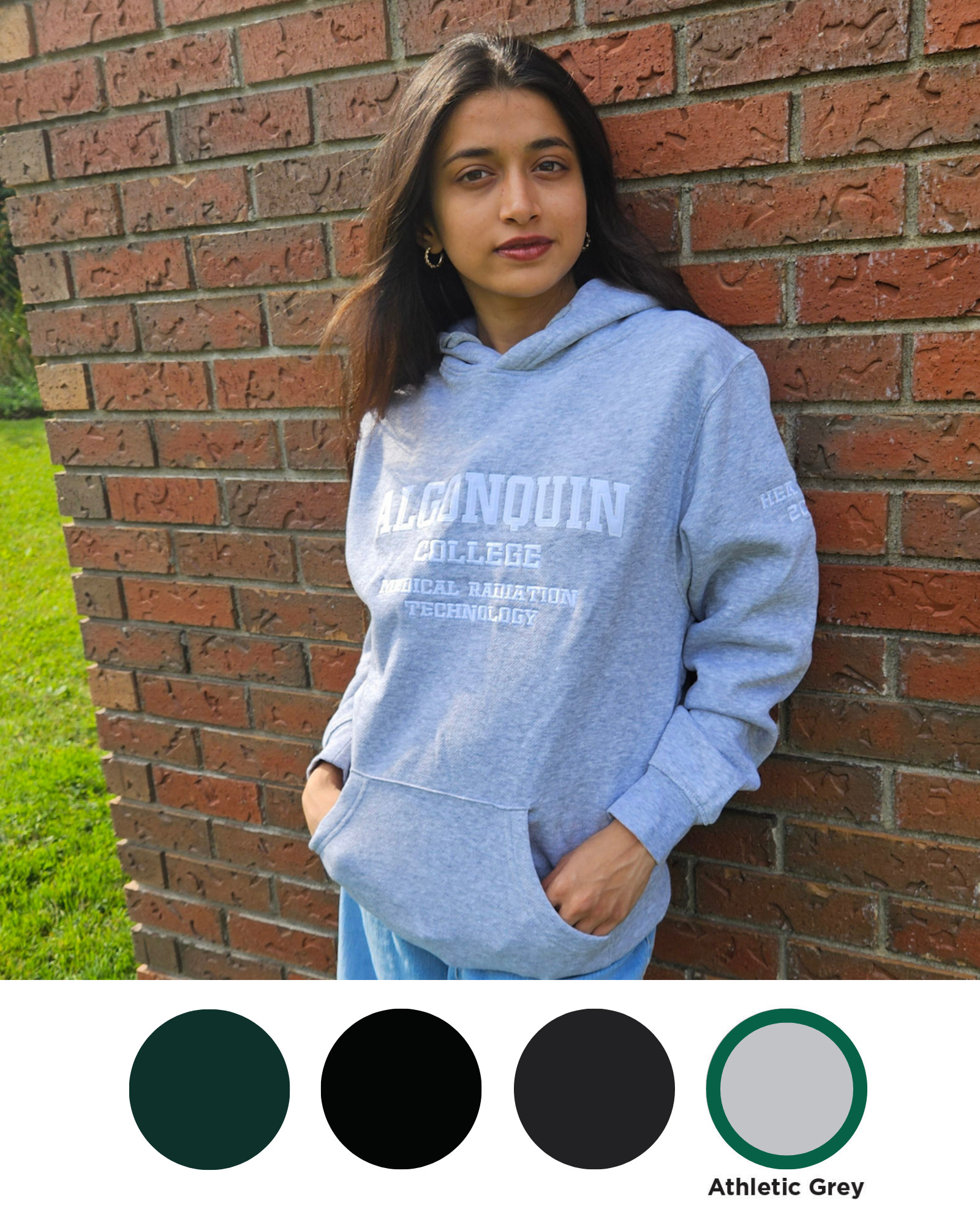 Custom Hoodie Week - Athletic Grey Pullover College student wearing an Algonquin College Hoodie in the athletic grey pullover style