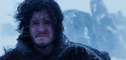 Animated Gif of a scene from Game of Thrones - where Jon Snow is outdoors in a snow storm.