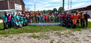 Group shot from DARE6 Volunteer Day at Madahowki Farm May 28, 2025