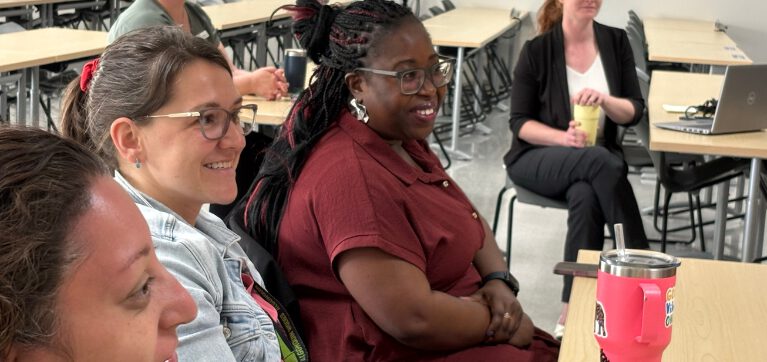 Nursing students at the Pembroke Campus gather to hear Madore's talk.