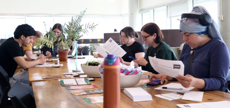 Students working on their letters during the event.