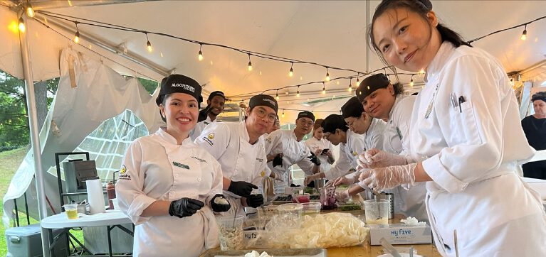 Learners preparing food at the Prime Minister's Annual Garden Party.