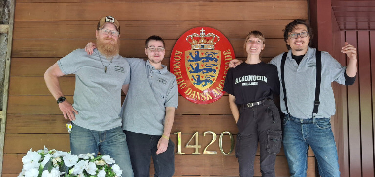 Cabinetmaking students pictured in front of the Embassy of the Kingdom of Denmark in Ottawa, Ontario.