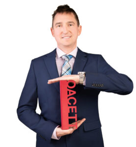 Graham Timperon holds his OACETT award.