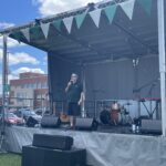 President and CEO, Claude Brulé speaking on stage at the President's BBQ 2024