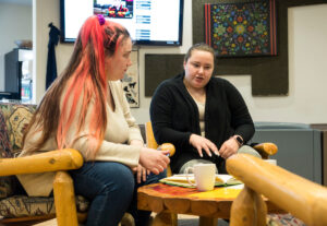 Two students having a conversation in the Mamidosewan Centre