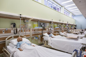 A row of child mannequins in the hospital-like setting of the Healthcare Simulation Centre