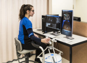 student working with simulation equipment in the sonography lab