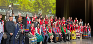 group photo of graduates attending ceremony