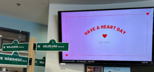 Large screen tv with have a heart day on the main screen. TV on display in Mamidosewin Centre