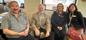 Kirby Whiteduck, Claude Brule, Jenny Tenasco and Anita Tenasco meet to discuss Indigenous initiatives in the president's office.