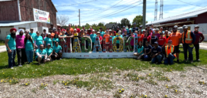 Group shot from Madahowki Farms DARE6 Volunteer Day on May 28, 2025