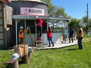 volunteers painting at work day