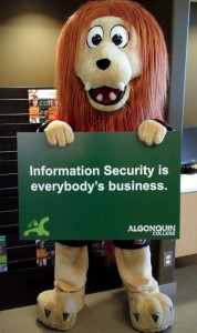Senators Mascot Spartacat Holding 'Information Security is Everybody's Business' sign