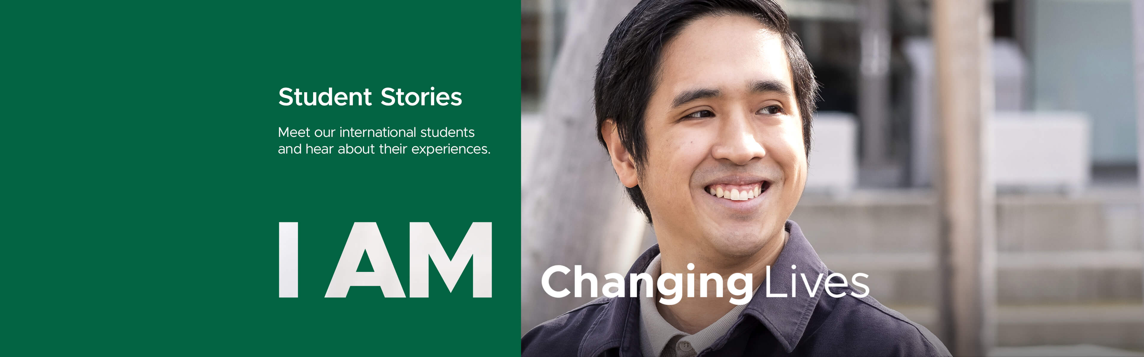 male student smiling over shoulder