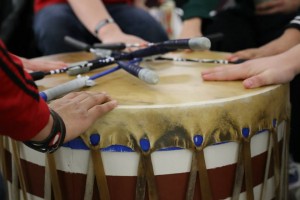 Hands drumming during Powwow.