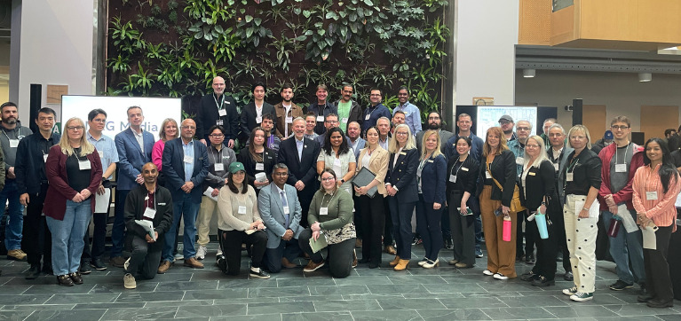 Industry experts and Algonquin College employees gather for a judges photo with Claude Brulé, President and CEO.