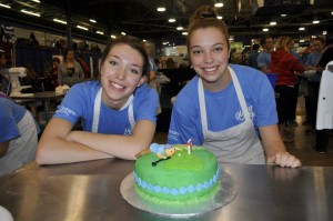 Students displaying their cake/