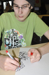 A male student doing some zen doodling