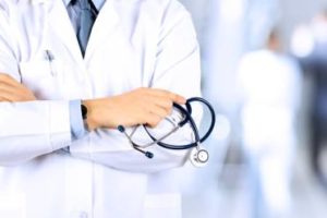 Doctor Holding Stethoscope, Algonquin College, Pembroke Campus