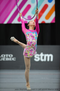 Kimana Mar performs a rhythmic gymnastics routine. 